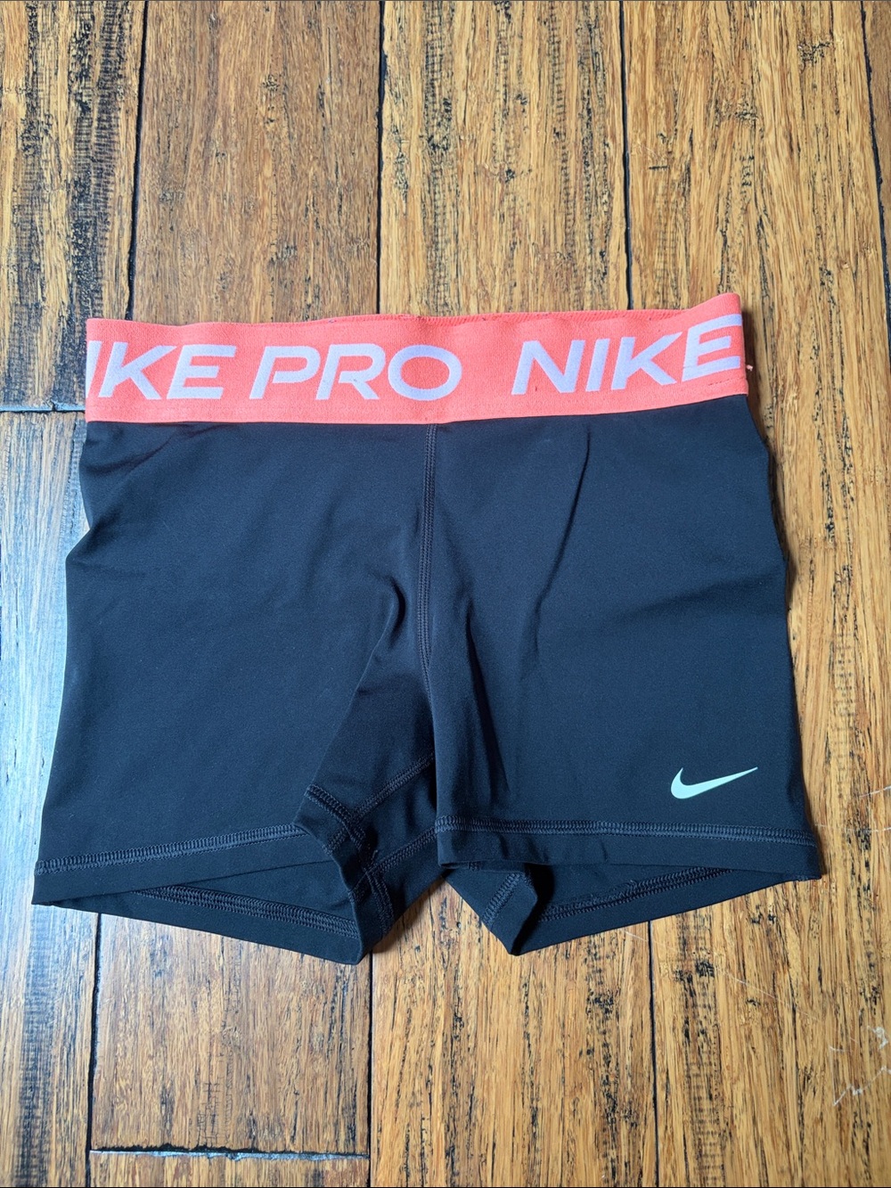 Nike Pro Black 3-inch Bike Shorts with Coral Logo Waistband